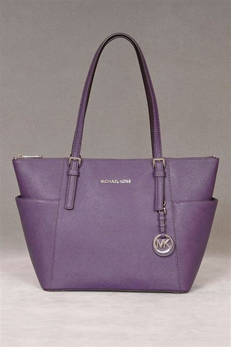 women's purple Michael Kors purse